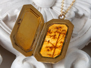Vintage locket with tree and bird painting