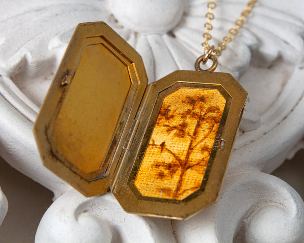 Vintage locket with tree and bird painting