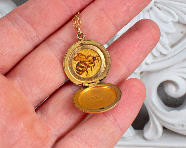 vintage locket necklace with bee painting