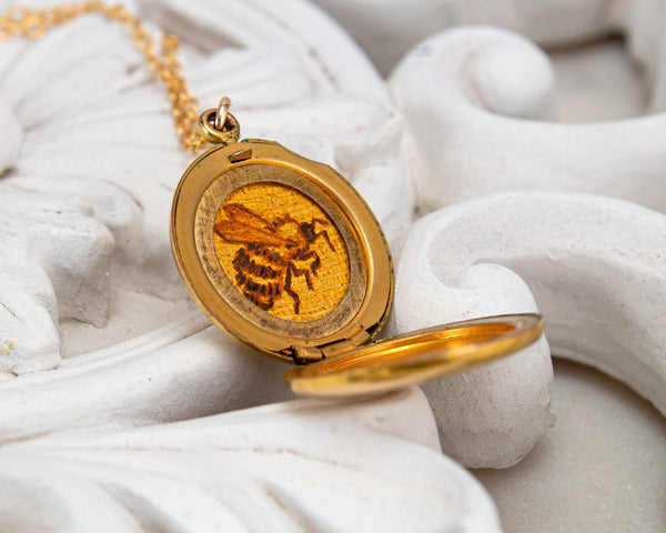 vintage locket necklace with bee painting