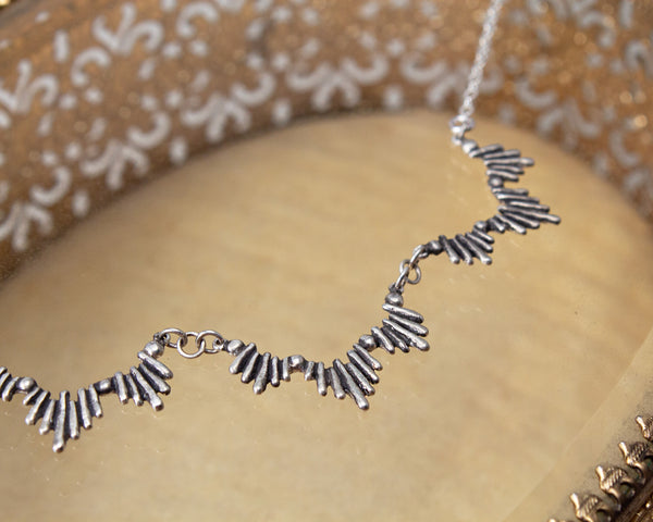 sterling silver sunburst statement necklace
