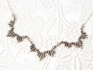 sterling silver sunburst statement necklace