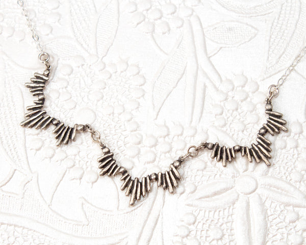 sterling silver sunburst statement necklace