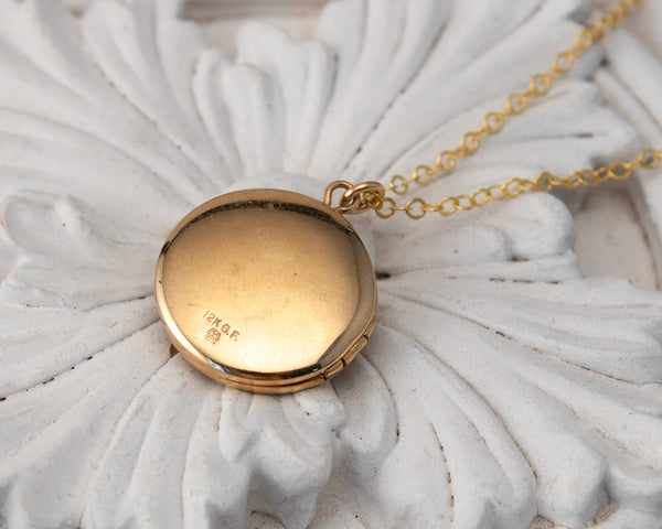 vintage locket with wildflower painting