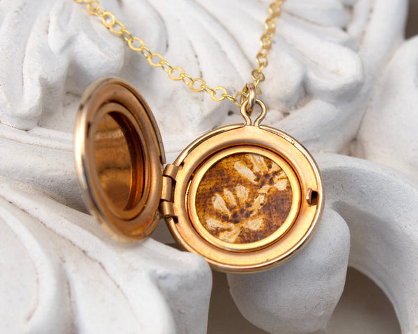 vintage locket with wildflower painting