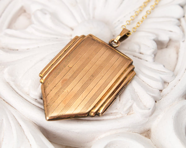 Vintage gold locket necklace with mountains