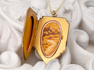 Vintage gold locket necklace with mountains