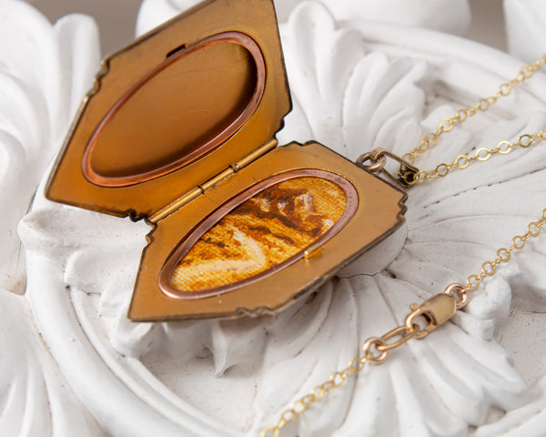 Vintage gold locket necklace with mountains