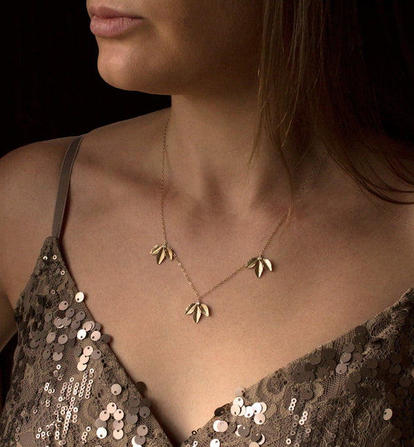 elegant gold leaf necklace
