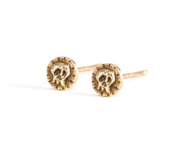 Small skull stud earrings, solid gold